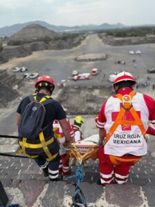 This handout picture released by the Mexican Red Cross shows forensic experts and Red Cross personnel transporting a body at the Pyramid of the Moon in the Teotihuacan archaeological zone following a shooting on April 20, 2026. PHOTO: AFP/ MEXICAN RED CROSS