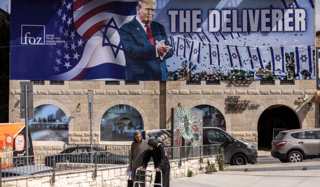 A banner shows U.S. President Donald Trump with the slogan 'The Liberator' in Jerusalem on April 20, 2026. Iran has no plans to attend talks with the United States. PHOTO: AFP/ JOHN WESSELS