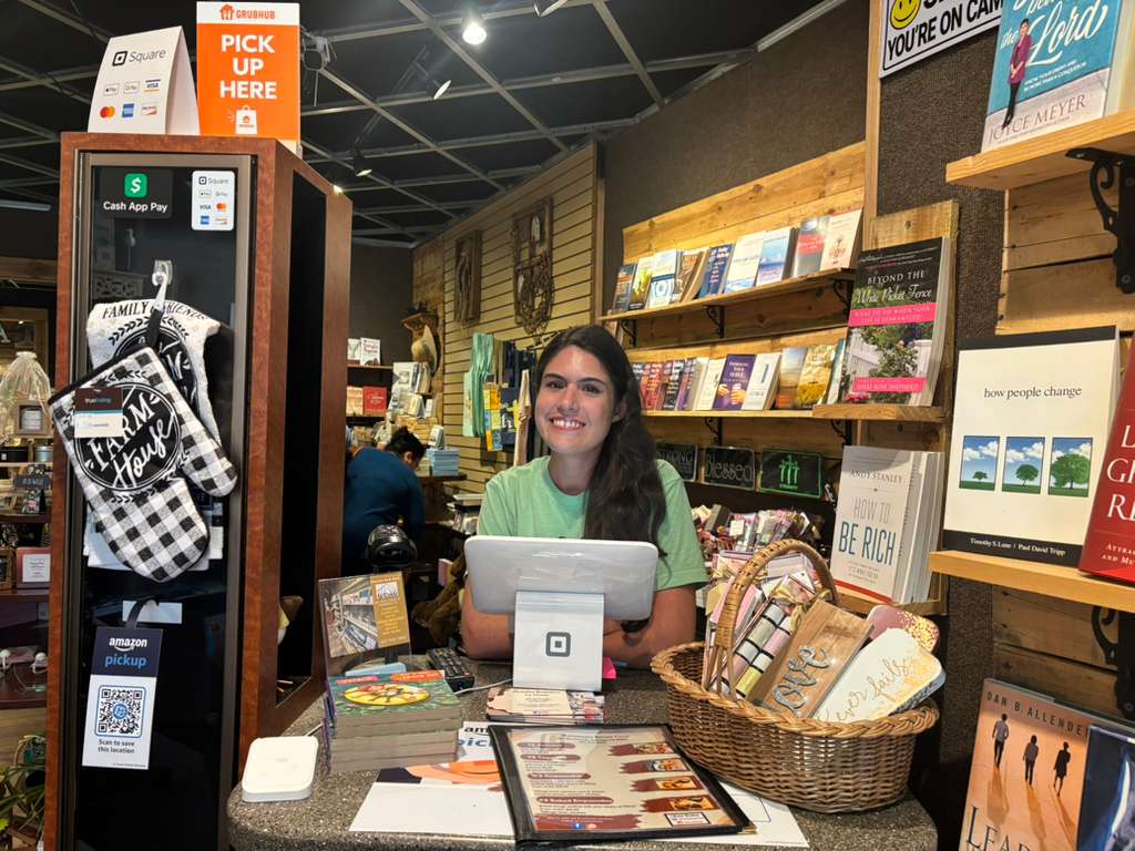 Daniela Smith and her parents own La Tienda, a business that combines a bookstore and restaurant on Ambridge’s main street.